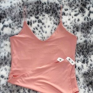 Pink body suit